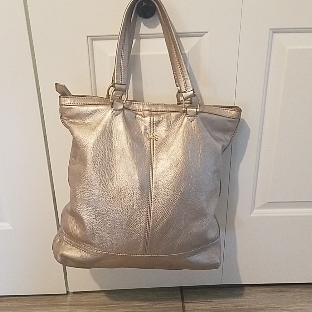 Burberry gold leather bag . 9"L x W 6" x 18"H